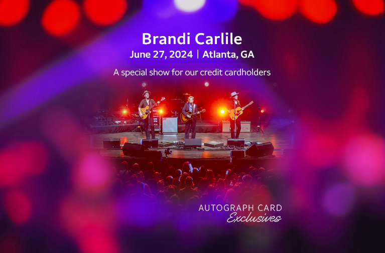 Brandi Carlile, June 27, 2024, Atlanta, GA. A special show for our credit cardholders. Brandi Carlile, and the Hanesworth twins perform on stage in front of an audience. Autograph Card Exclusives logo.
